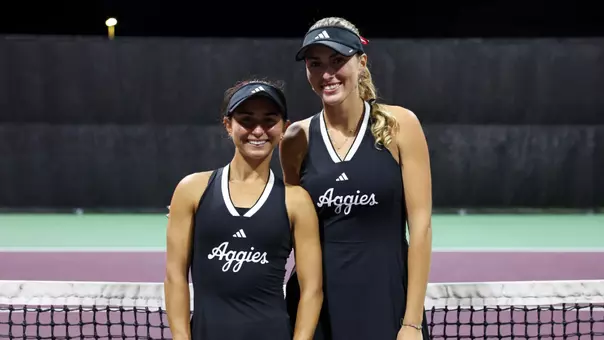 Violeta Martinez and Lexington Reed pose following Martinez's Senior Night ceremony