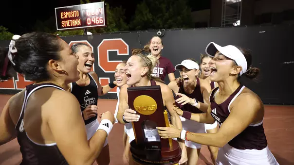 Women's TEnnis with the national championship trophy