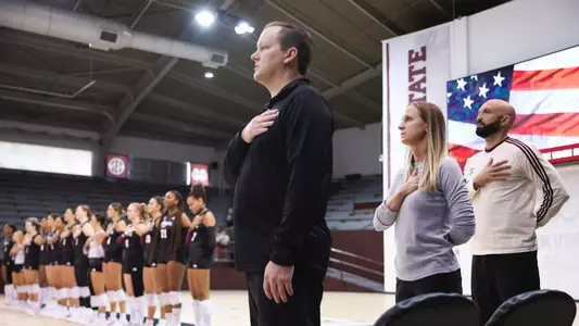 STARKVILLE, MS - October 12, 2025 - Director of Analytics Joe Skinner of the Texas A&M Aggies, Associate Head Coach Jen Woods of the Texas A&M Aggies, and Head Coach Jamie Morrison of the Texas A&M Aggies during the game between the Mississippi St. Bulldogs and the Texas A&M Aggies at Newell-Grissom Building in Starkville, MS. Photo By Sydney Stevenson