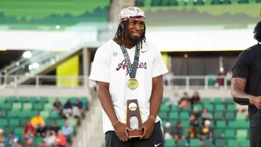 Zaza Smiling on NCAA Podium