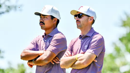 Phichaksn Maichon and Assistant Coach Matt Fast look menacing as they contemplate the next shot.