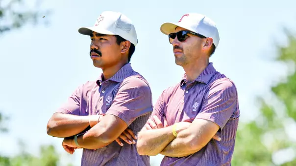 Phichaksn Maichon and Assistant Coach Matt Fast look menacing as they contemplate the next shot.