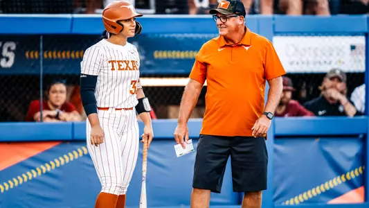 Mary Iakopo and Coach White during game one against Oklahoma