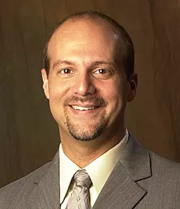 Dr. Mark Chassay