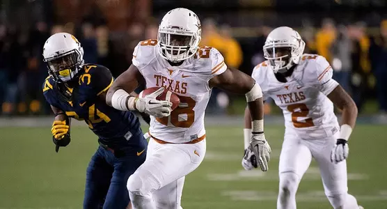 131109 RB Malcolm Brown breaks free for a big gain vs. West Virginia.