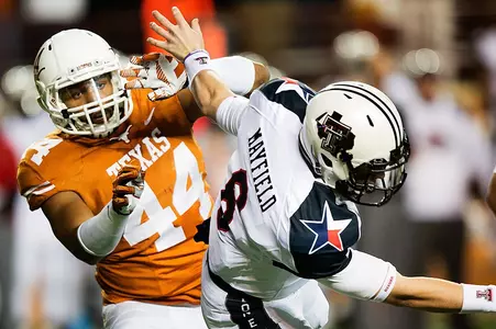 DE Jackson Jeffcoat with a QBH on the Tech QB.