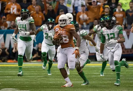 RB Malcolm Brown runs to daylight.