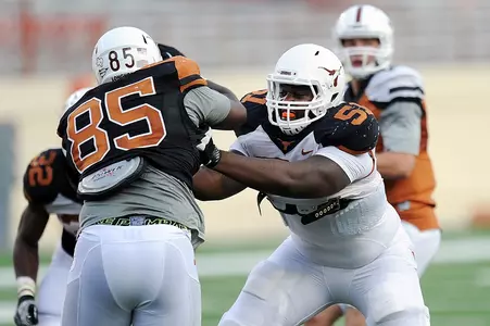 OT Donald Hawkins (51) and DT Ashton Dorsey (85)