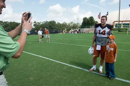 QB David Ash (14) poses with Mason Burkett