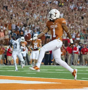 WR Mike Davis scores a 13-yard TD in the first quarter.