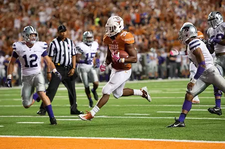 RB Johnathan Gray scores a 15-yad TD in the 3rd quarter.