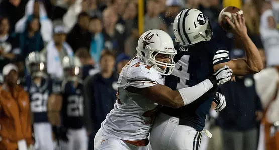 Jackson Jeffcoat tackles a BYU player