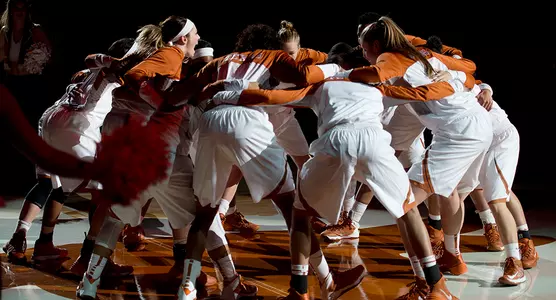 Women's Basketball team huddle