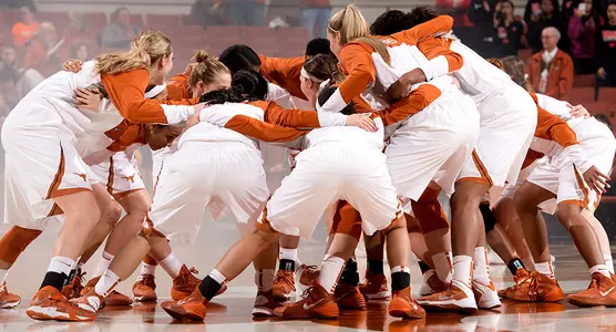 Women's Basketball team huddle