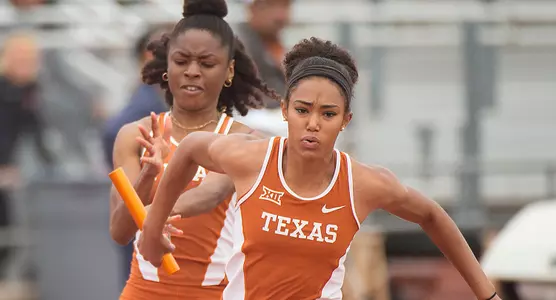 Courtney Okolo hands off the baton to Shania Collins