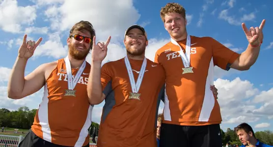 Clint Harris, Will Spence and Ryan Crouser with medals