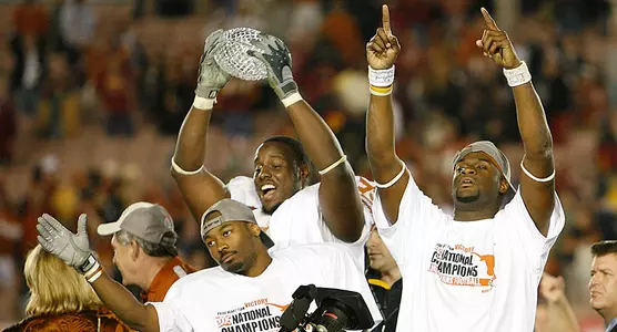 Michael Huff. Johnathan Scott and Vince Young