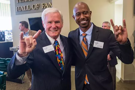 Fred Akers, T.J. Ford