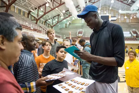 Mo Bamba signing autographs at Tip-Off