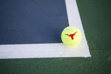 Longhorn tennis ball on court
