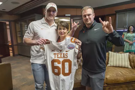 Tom Herman and Breckyn Hager with Lynn Nobis