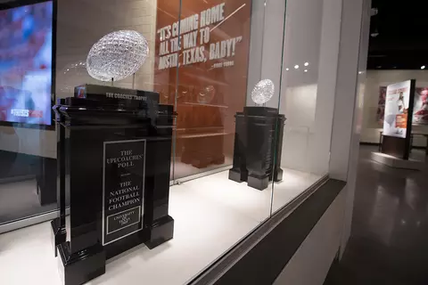 The Frank Denius Family University of Texas Hall of Fame Football National Championship trophies
