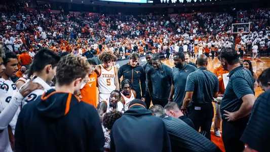 staff and team huddle