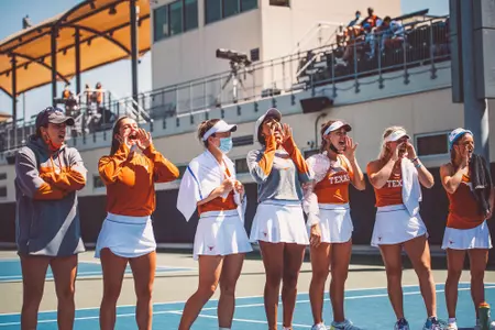 women's tennis team cheering
