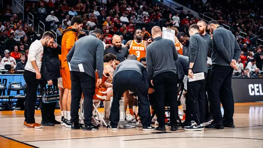 ncaa second-round team huddle