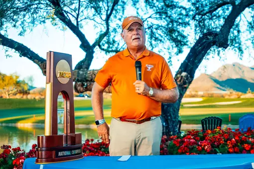 John Fields with 2022 NCAA team trophy
