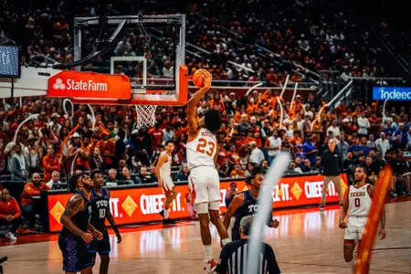 Dillon Mitchell dunks during the TCU game
