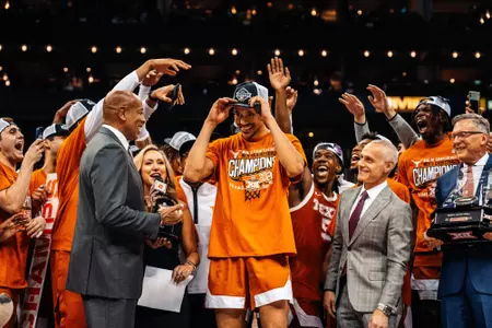 Dylan Disu is presented with the Most Outstanding Player honor