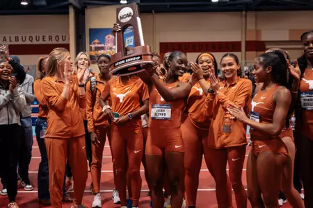 Julien Alfred celebrates team National Runner-Up finish