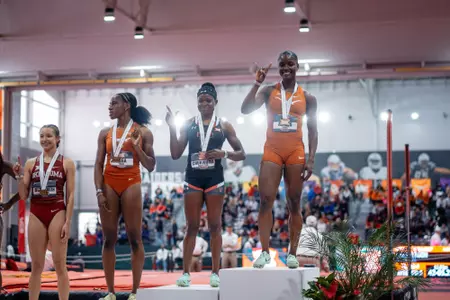 Julien Alfred - Big 12 Champion Podium Shot
