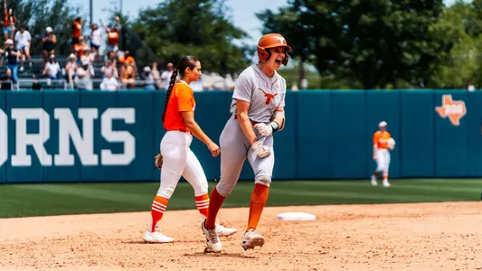 Reese Atwood rounds the bases following her homer that led to a 3-2 win over Oklahoma State