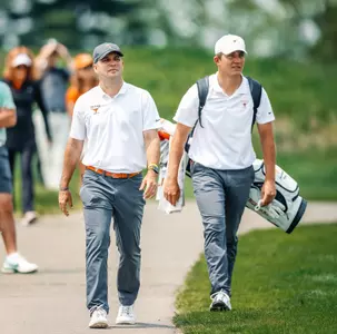 Erik Henson walks with Christiaan Maas