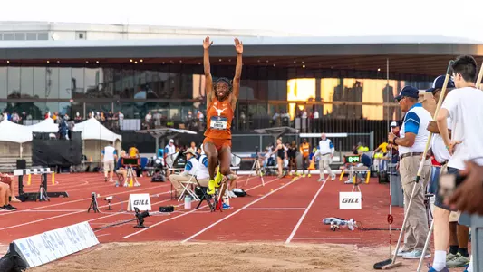 Ackelia Smith competes in Saturday's triple jump