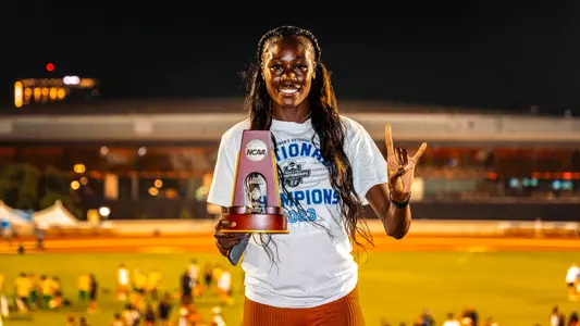Rhasidat Adeleke celebrates her 400m championship