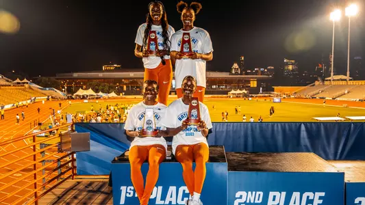 The Texas 4x100 relay team with their trophies