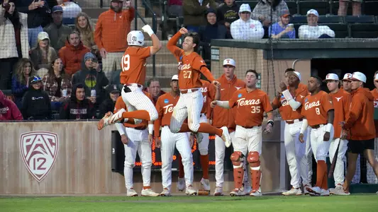 Mitchell Daly celebrates his home run with Jack O'Dowd during game two of the Super Regional