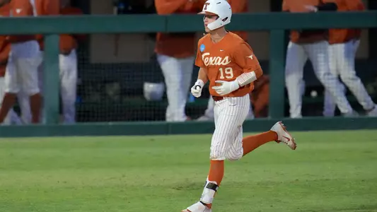 Mitchell Daly crosses home following his homer during game two of the super regional
