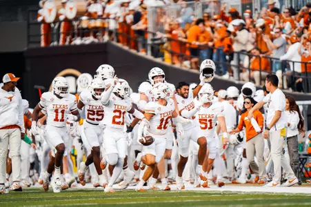 Texas' defense celebrates Michael Taaffe's interception during the second quarter vs. Vanderbilt on Oct. 26.