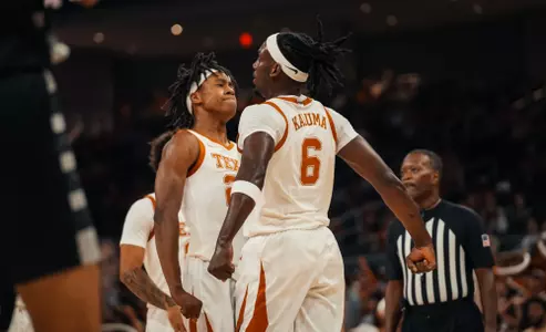 Arthur Kaluma celebrates with Tre Johnson