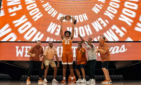 John Clark with men's basketball staff