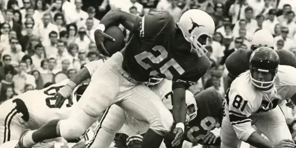 Chris Gilbert runs the ball against Oklahoma in 1961.