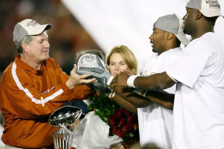 Mack Brown, Michael Huff and Vince Young at postgame ceremony at 2005 Rose Bowl
