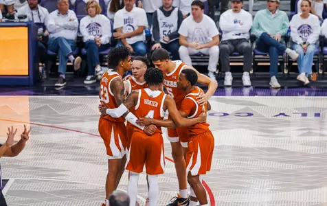 huddle on court at TCU