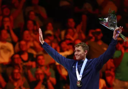 INDIANAPOLIS, INDIANA - JUNE 16: Carson Foster of the United States reacts after receiving the gold medal for the Men's 400 Meter Individual Medley Championship on Day Two of the 2024 U.S. Olympic Team Swimming Trials at Lucas Oil Stadium on June 16, 2024 in Indianapolis, Indiana. (Photo by Sarah Stier/Getty Images)