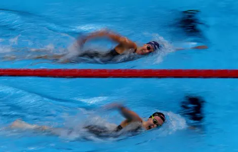 INDIANAPOLIS, INDIANA - JUNE 21: Jillian Cox (below) and Paige Madden (above) of the United States competes in a preliminary heat of the Women's 800m freestyle on Day Seven of the 2024 U.S. Olympic Team Swimming Trials at Lucas Oil Stadium on June 21, 2024 in Indianapolis, Indiana. (Photo by Sarah Stier/Getty Images)