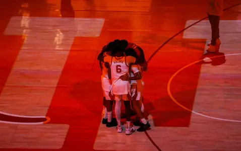 pre-game player huddle on court